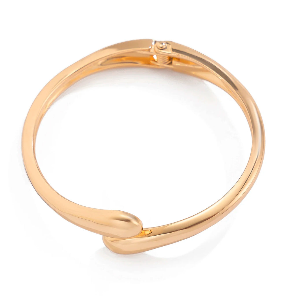 Pulsera Dorada Water Drop de Lujo para Mujer – Brazalete Elegante y Modernoft